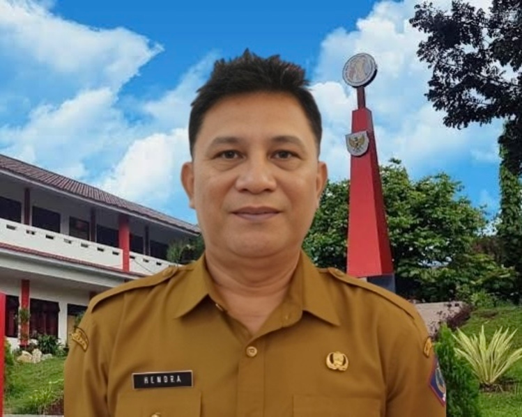 Hendra Massie, S.pd., M.M.